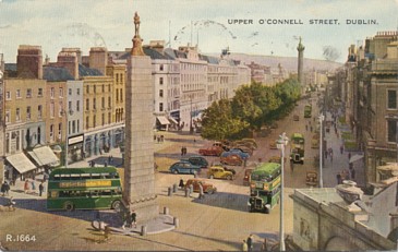 Featured is a postcard image of Upper O'Connell St. in Dublin, Ireland. The original postally used card (postmarked 1955) is for sale in the unltd.com Store.